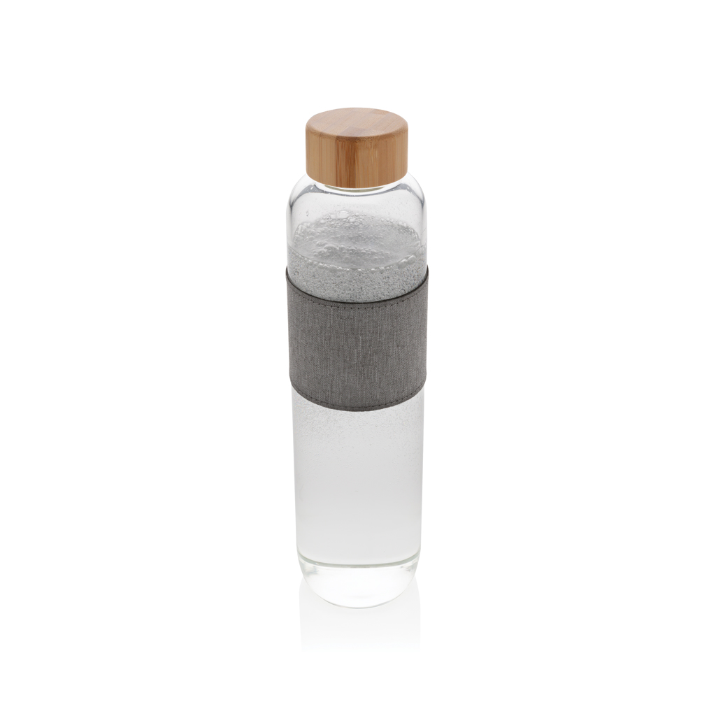 Glasflasche, Holzdeckel, Stoffband, Transparente Flasche, Korkdeckel, glasflasche, Holzdeckel, graue Hülle, klare Flüssigkeit, sleeve?, Glasflasche, Holzdeckel, Kork, Griffband, Krelease, Trinkglas, Glasball, Holzdeckel, Kunststoffbehälter, Satz Gläser